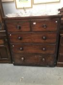 A darkwood 2 over 3 chest of drawers