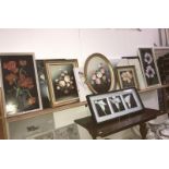 A good lot of floral paintings and prints