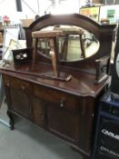 An Edwardian mahogany mirror backed sideboard