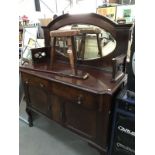 An Edwardian mahogany mirror backed sideboard