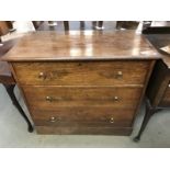 A 1930's oak chest of drawers