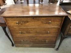 A 1930's oak chest of drawers