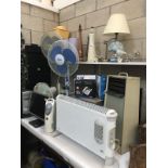 Large lot including Aladdin heater, electric heaters, fans, trouser press, computer tower,