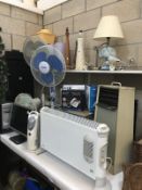 Large lot including Aladdin heater, electric heaters, fans, trouser press, computer tower,
