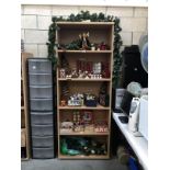 5 shelves of Christmas related items