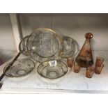 A Mary Gregory style decanter and glasses and a vintage dessert bowl and dishes