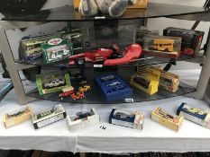 A quantity of diecast cars etc.