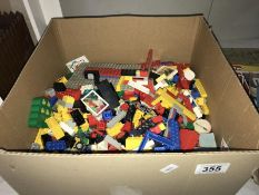 A box of vintage Lego