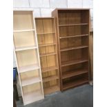 3 various sized book shelves