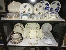 2 shelves of part dinner sets etc.