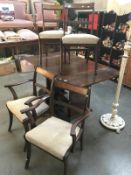 A set of 4 darkwood chairs with brass inlay to back