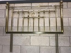 A brass effect 4'6" headboard