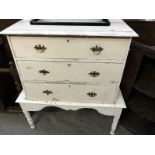 A Shabby chic painted chest of drawers on stand