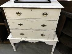 A Shabby chic painted chest of drawers on stand