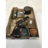 A mixed lot including a sunwatch, a mini miners lamp, a small box depicting Charles Fox,