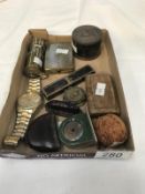 A mixed lot including a sunwatch, a mini miners lamp, a small box depicting Charles Fox,