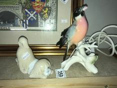 A Karl Ens bird and Valercia porcelain dog