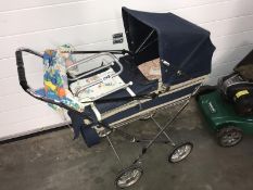 A dolls pram etc.