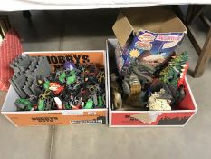 2 boxes of plastic soldiers etc. including castle, skullmaster etc.