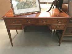 A dark wood stained inlaid writing desk