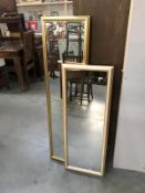 2 gold framed mirrors