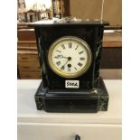 A marble mantle clock (working & with key)