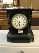 A marble mantle clock (working & with key)