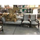 An Edwardian Chaise Lounge and matching his and her chairs