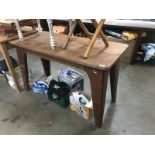 A light oak kitchen table