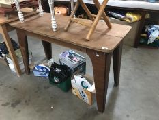 A light oak kitchen table