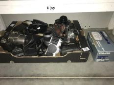 A box of assorted cameras and accessories including Olympus,