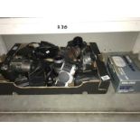 A box of assorted cameras and accessories including Olympus,