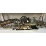A mixed lot of silver plate including cutlery and an old tin