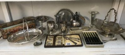 A mixed lot of silver plate including cutlery and an old tin