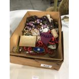 A box of costume jewellery, hatpins etc.