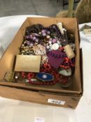 A box of costume jewellery, hatpins etc.