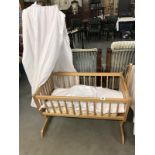 A pine baby's crib/cot