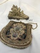 A tapestry bag with mirror and soapstone carving