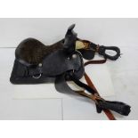 Western saddle, leather, wool fleece lined, with leather stirrups and 2 straps, suede seat, very