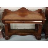 William IV mahogany Wall Table with raised shaped gallery, 2 apron drawers, large turned column