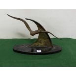 Art Deco bronze Sculpture of a tern swooping by a sail, signed verso “By Edouard Goy Compte De