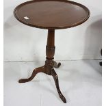 Circular mahogany Wine Table with raised rim, on tripod base, pad feet, 22"dia x 29.5"h