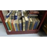 Shelf of hardback Books, mainly novels, some spiritual
