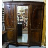 Mahogany 3 door Wardrobe, bow shaped front, 2 panel doors enclosing drawers, shelves and hanging