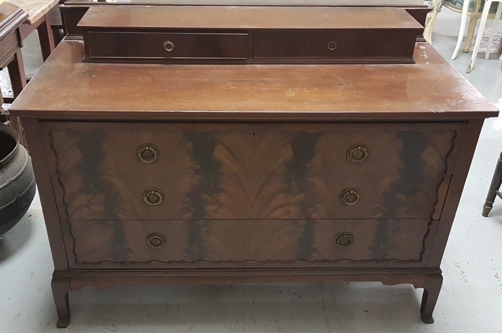 Edw. Flame Mahogany Chest of Drawers with a raised gallery of small drawers, 3 long drawers below,