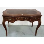 Louis IX style serpentine front Centre Table, tooled brown writing top, 3 apron drawers, on sabre