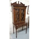 Late 19th C compact mahogany 2 door Bookcase, diamond glazed doors, reeded side pillars, on a