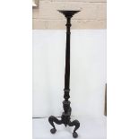 Mahogany Torchere on reeded column, on ball and claw feet, 57.5”