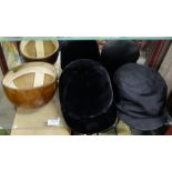 Two Hunt Hats – a “Silk Hunt Hat” with black silk cover and cork lined interior shell, labelled “