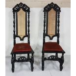 Matching Pair of Jacobean Style dark oak Hall Chairs, with bergere backs, above red velvet covered